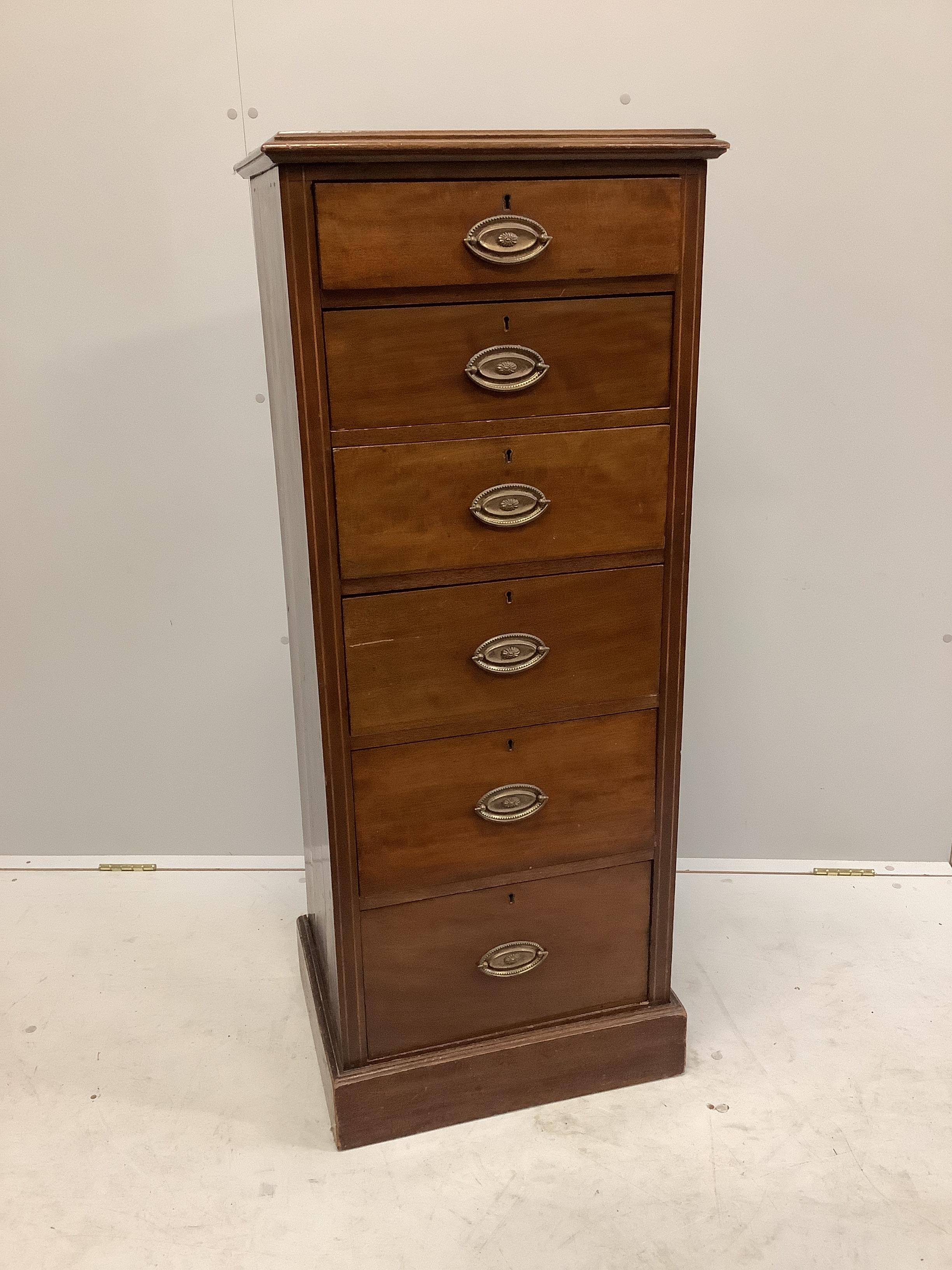 An Edwardian mahogany six drawer pillar chest, width 50cm, depth 41cm, height 125cm